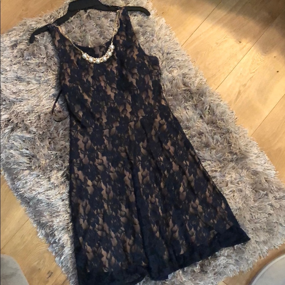 Dark blue floral dress with jewelry piece